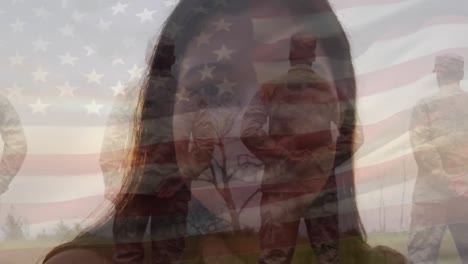 Animation-of-flag-of-united-states-of-america-over-smiling-woman-and-soldiers