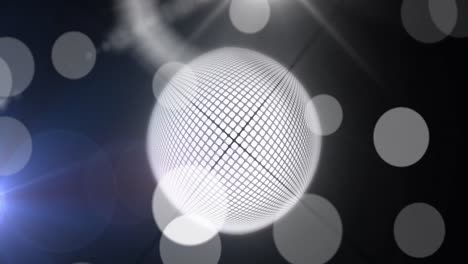 Animation-of-mirrorball-and-white-bokeh-lights-on-dark-background