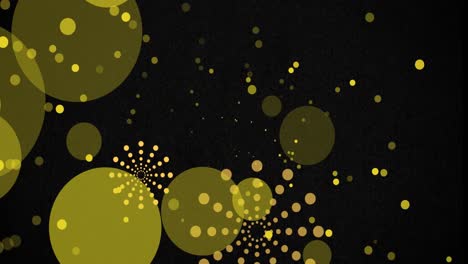 Animation-of-orange-firework-explosions-and-bokeh-yellow-light-spots-on-black-background