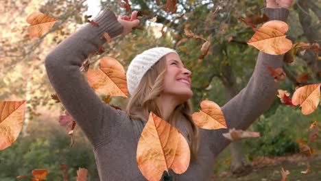 Animation-of-autumn-leaves-falling-over-happy-caucasian-woman-in-park