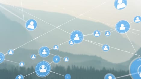 Animation-of-network-of-connections-with-people-icons-over-landscape