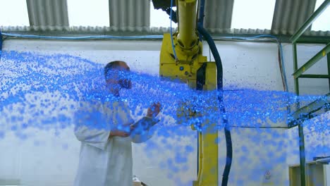 Animación-De-Una-Malla-Azul-Brillante-Sobre-Un-Científico-Masculino-Con-Robot-Y-Tableta