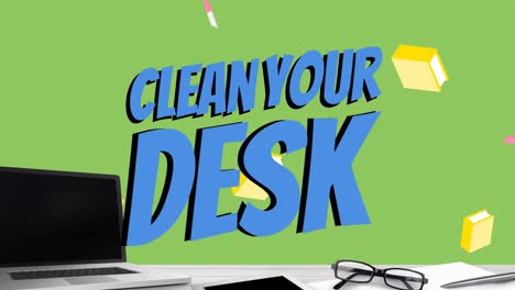 Animation-of-clean-your-desk-text-over-laptop-and-office-items-over-green-background