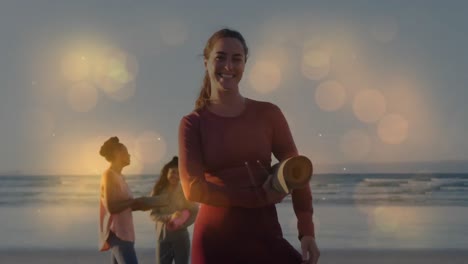 Animation-of-happy-diverse-female-friends-practicing-yoga-at-beach-over-light-spots