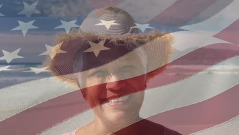 Animation-of-happy-senior-african-american-woman-at-beach-over-american-flag