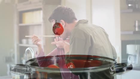 Animation-of-happy-diverse-couple-cooking-over-tomatoes-in-pot