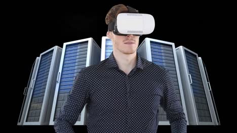 Animation-of-clock-moving-fast-over-businessman-wearing-vr-headset-by-computer-servers