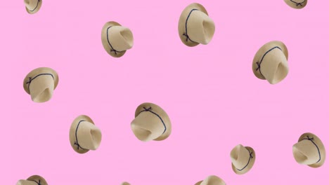 Animation-of-hats-with-ribbon-falling-on-pink-background