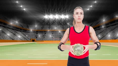Animation-of-caucasian-female-handball-player-holding-ball-over-sports-stadium