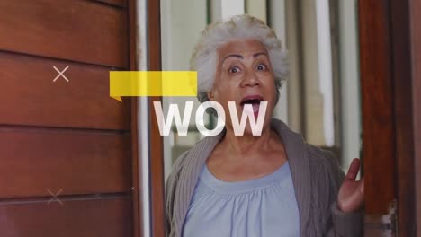 Animation-of-wow-text-over-happy-biracial-senior-woman-opening-door