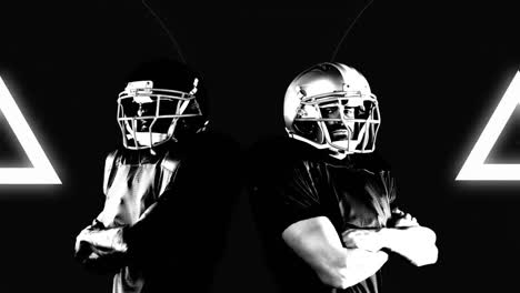 Animation-of-two-american-football-players-over-triangles-and-circles-on-black-background