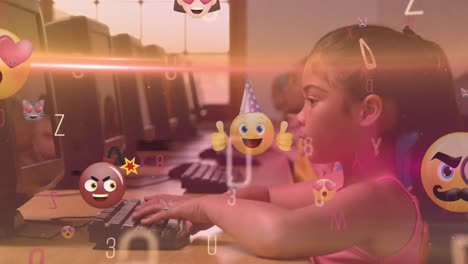 Animation-of-emoji-floating-over-latin-girl-using-computer