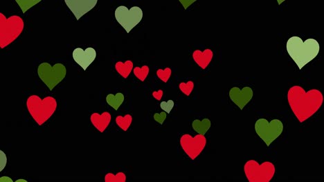 Animation-of-red-and-green-hearts-on-black-background