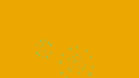 Animation-of-green-fireworks-on-orange-background