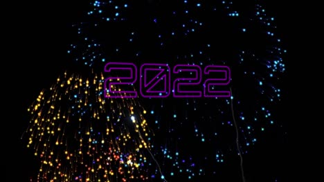 Animation-of-2022-text-over-colorful-fireworks