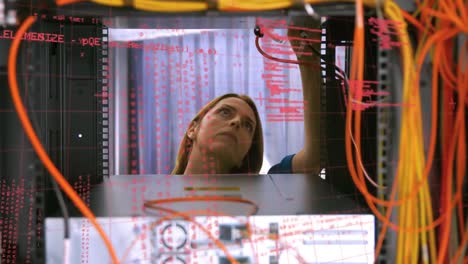 Animation-of-data-processing-over-caucasian-woman-in-server-room