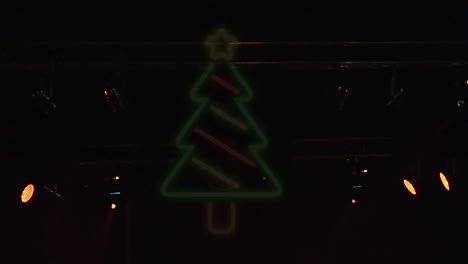 Animation-of-christmas-neon-over-street-lights