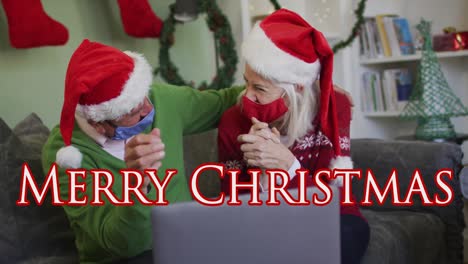 Animation-of-merry-christmas-text-over-senior-caucasian-couple-having-video-call-with-santa-hats