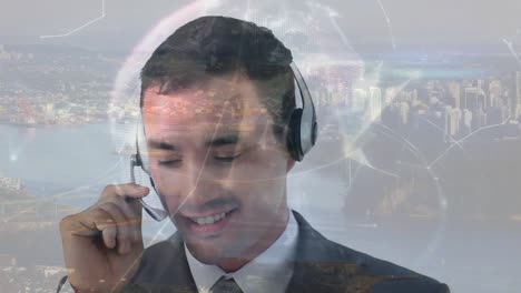 Animation-of-globe-and-data-processing-over-business-man-using-phone-headset