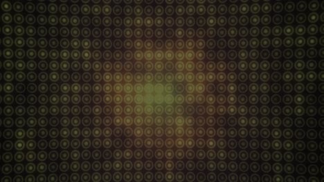 Animation-of-multiple-orange-circles-in-row-on-black-background