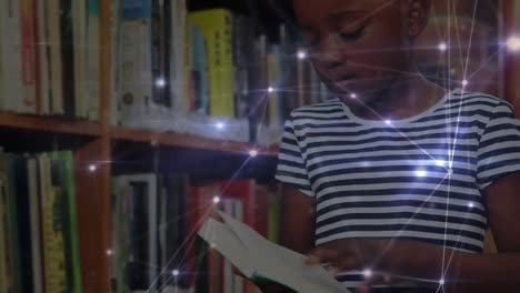 Animation-of-networks-of-connections-over-african-american-schoolgirl-reading-book