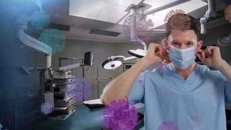 Animation-Von-Viruszellen-über-Einem-Kaukasischen-Männlichen-Arzt-Mit-Gesichtsmaske