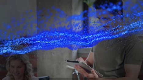 Animation-of-blue-glowing-wave-over-studding-people