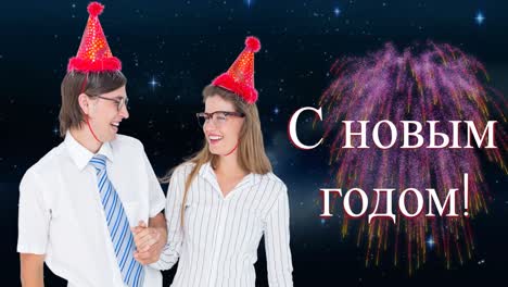 Animation-of-happy-new-year-text-over-fireworks-and-smiling-caucasian-couple