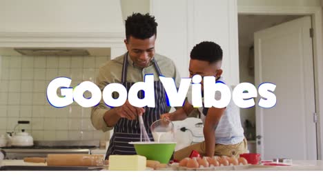 Animation-of-good-vibes-text-over-smiling-african-american-father-and-son-baking