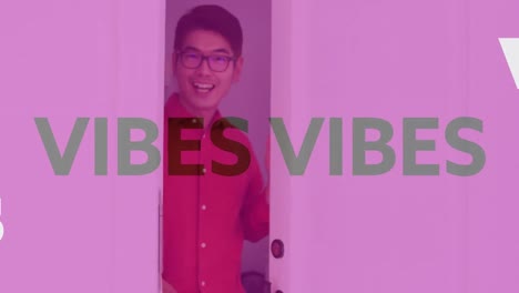 Animation-of-vibes-text-over-smiling-asian-man