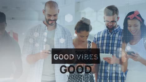 Animation-of-good-vibes-text-over-smiling-diverse-friends-using-smartphones-and-tablet