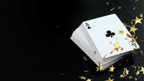 Animation-of-moving-stars-over-cards-on-black-background