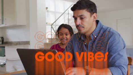 Animation-of-good-vibes-text-over-hispanic-father-using-laptop-with-daughter
