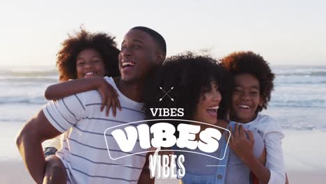 Animation-of-vibes-text-over-smiling-african-american-family-embracing-at-beach