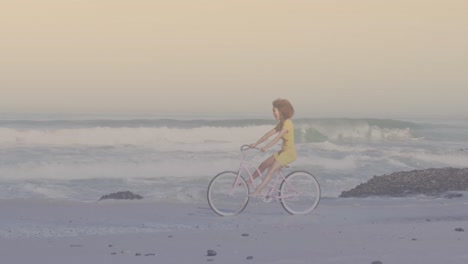 Spots-of-light-against-african-american-woman-riding-a-bicycle-at-the-beach