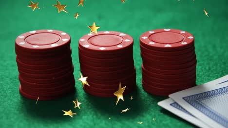 Animation-of-gold-stars-falling-over-two-three-stack-of-casino-chips-and-card-on-green-background