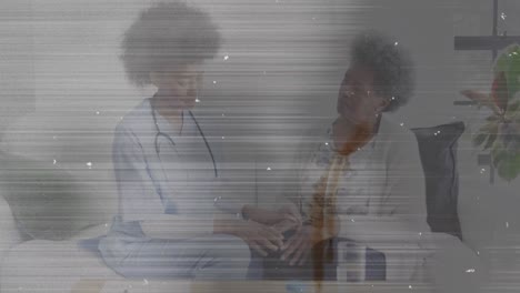 Animation-of-interference-over-senior-african-american-patient-talking-with-female-doctor
