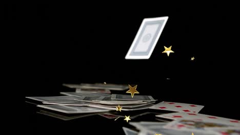 Animation-of-gold-stars-over-falling-playing-cards-on-black-background