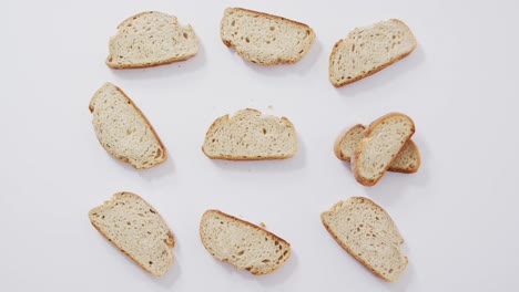 Video-of-slices-of-bread-seeing-from-above-on-white-background