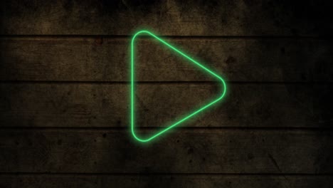 Animation-of-glowing-neon-arrow-icon-on-brick-wall