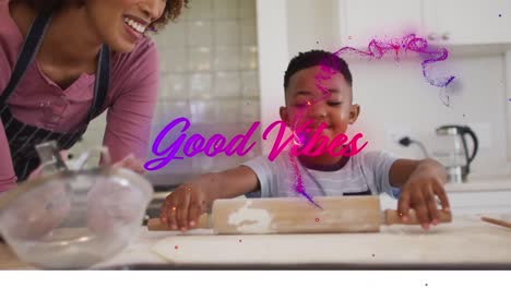 Animation-of-good-vibes-text-with-african-american-mother-and-son-baking-together