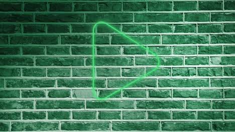 Animation-of-glowing-neon-arrow-icon-on-brick-wall