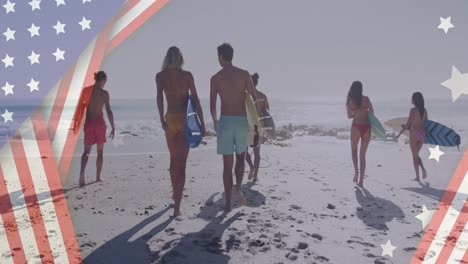 Animation-of-american-flag-over-diverse-group-of-friends-walking-with-surfboards-at-beach