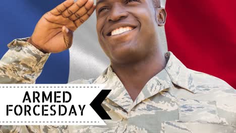 Animation-of-armed-forces-day-text-and-african-american-male-soldier-over-flag-of-france