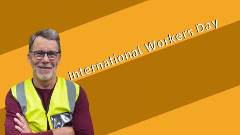 Animation-of-smiling-senior-caucasian-male-worker-over-international-workers-day-text