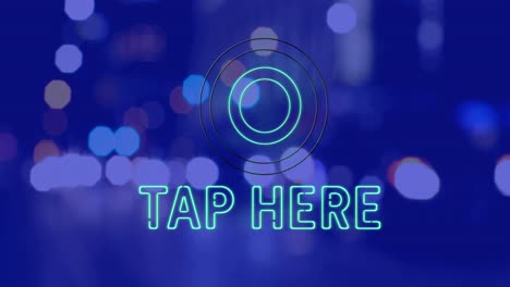 Animation-of-tap-here-text-over-cityscape-at-night-on-blue-background