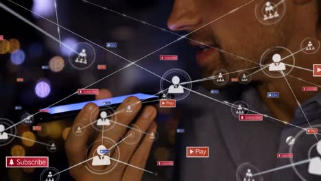 Animation-of-network-of-connections-with-media-icons-over-caucasian-man-using-smartphone
