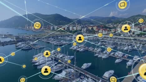 Network-of-digital-icons-against-aerial-view-of-a-harbor