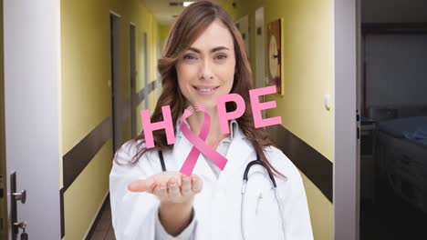 Animation-of-hope-and-breast-cancer-awareness-ribbon-over-caucasian-female-doctor