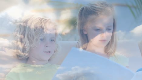 Animation-of-clouds-over-caucasian-children-reading-books